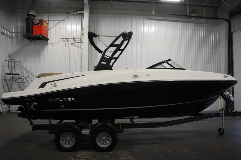 Slide: The Image of 2025 Bayliner VR6 Bowrider OB on trailer in indoor storage facility. - 3