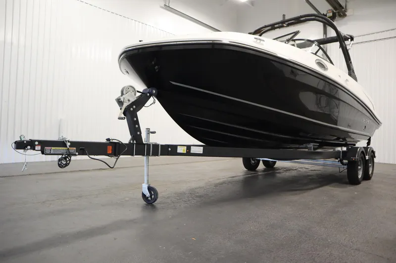Slide: The Image of 2025 Bayliner VR6 Bowrider OB on trailer in indoor storage facility. - 56