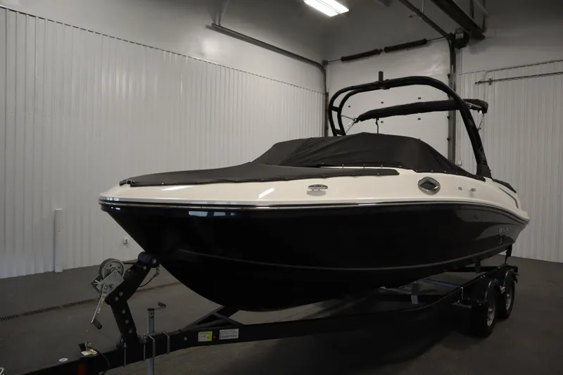 Slide: The Image of 2025 Bayliner VR6 Bowrider OB in indoor storage on trailer. - 58