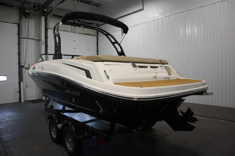 Slide: The Image of 2025 Bayliner VR6 Bowrider OB in a garage, showcasing sleek design and modern features. - 6