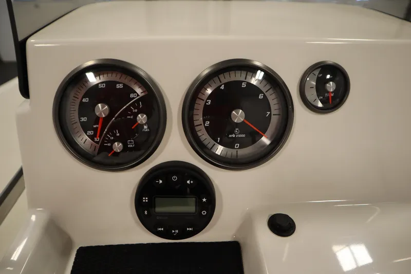 Slide: The Image of Dashboard of 2026 Bayliner Trophy T18 boat with gauges and controls. - 23