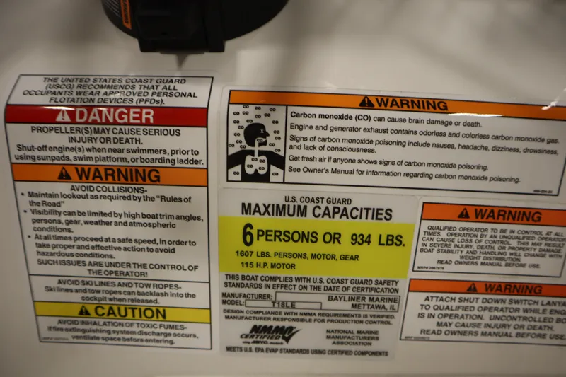 Slide: The Image of Safety warnings and capacity limits on a 2026 Bayliner Trophy T18 boat. - 25