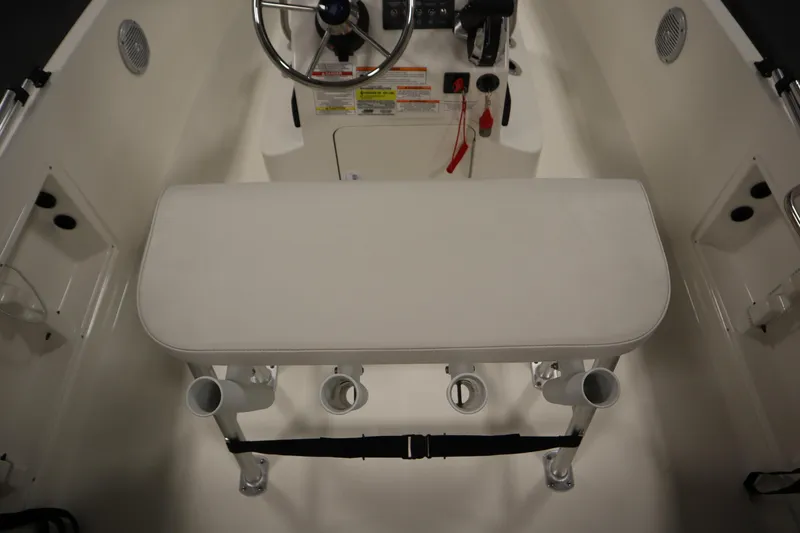 Slide: The Image of Interior view of 2026 Bayliner Trophy T18 boat cockpit with steering wheel and seating. - 29