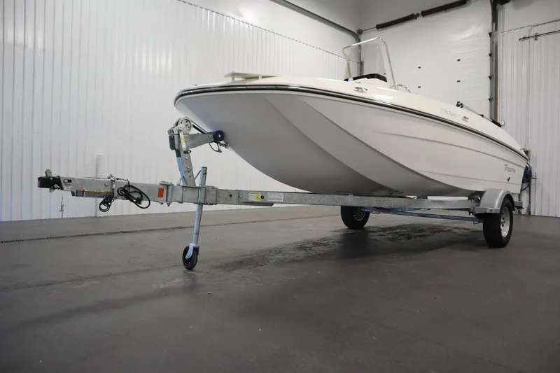 Slide: The Image of 2026 Bayliner Trophy T18 boat on trailer in indoor storage facility. - 41