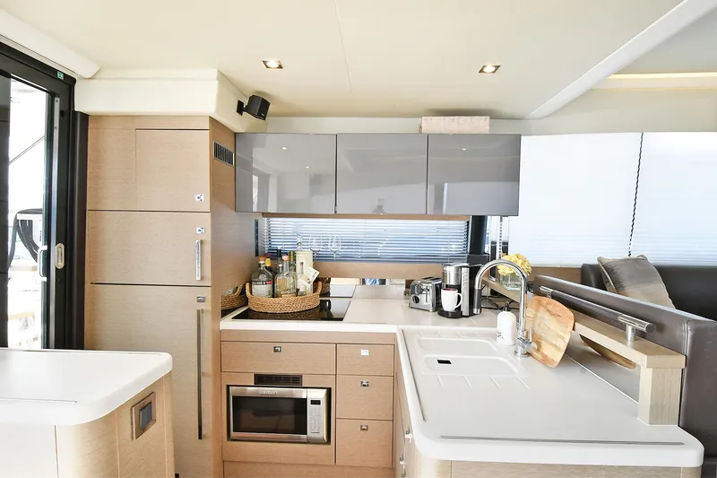 Slide: The Image of Luxurious kitchen interior of 2018 Prestige 560 Fly yacht with modern appliances. - 19