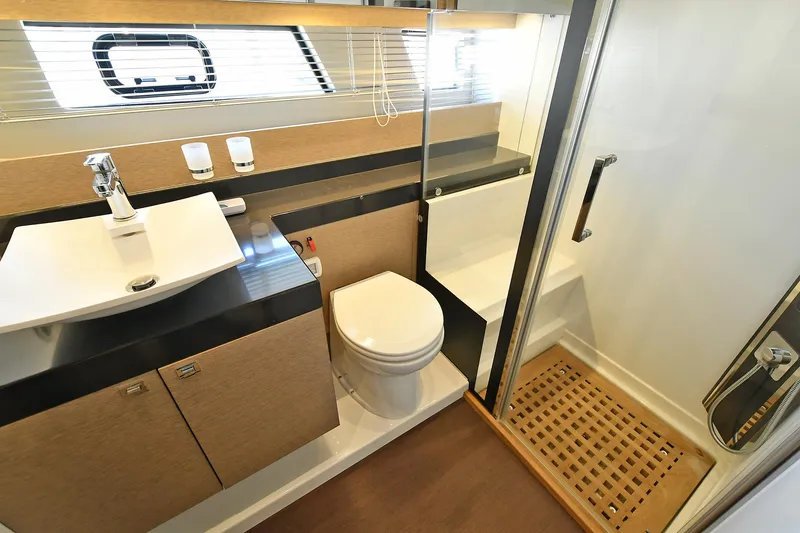 Slide: The Image of Luxurious bathroom in 2018 Prestige 560 Fly yacht with modern fixtures and shower. - 38