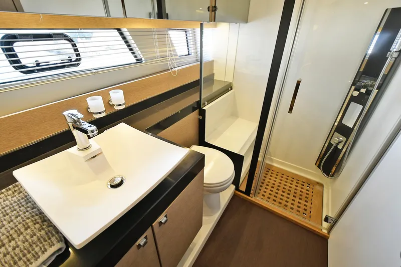 Slide: The Image of Luxurious bathroom in 2018 Prestige 560 Fly yacht with modern fixtures and shower. - 39