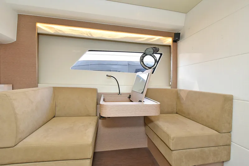 Slide: The Image of Interior of 2018 Prestige 560 Fly yacht with beige seating and modern design. - 47