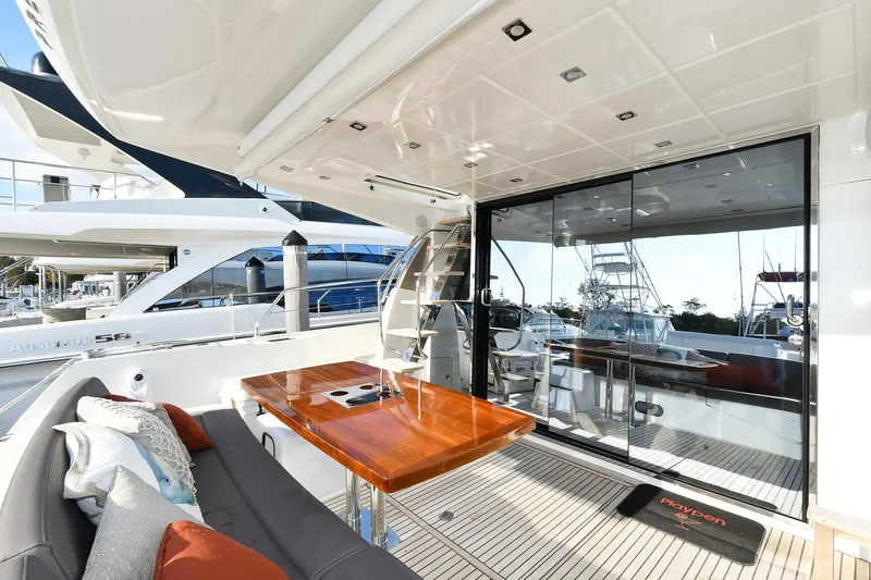 Slide: The Image of Luxury yacht deck with seating and table, Prestige 560 Fly, 2018 model. - 6
