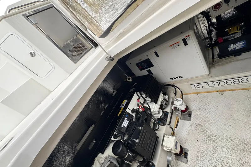 Slide: The Image of Engine compartment of 2019 Cruisers Yachts 42 Cantius with Kohler generator. - 22