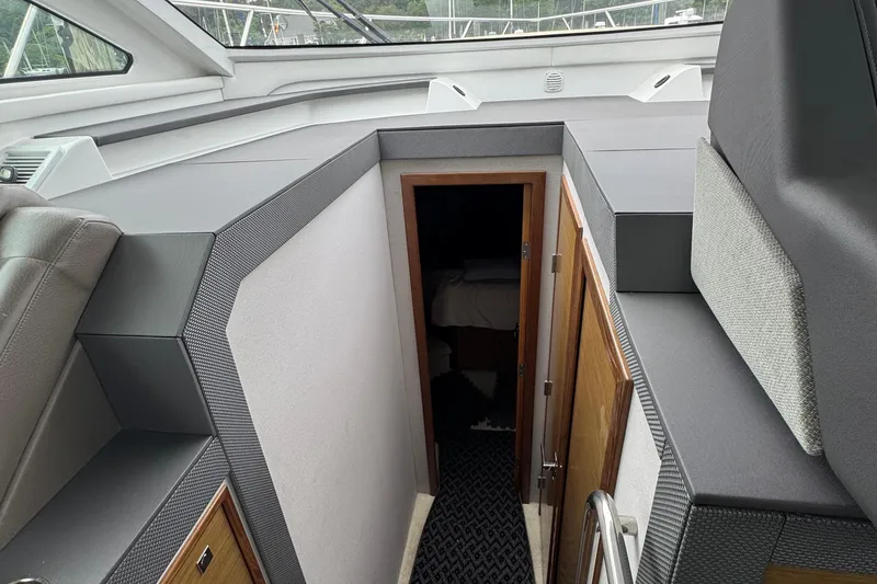 Slide: The Image of 2019 Cruisers Yachts 42 Cantius interior cabin entrance with modern design elements. - 45