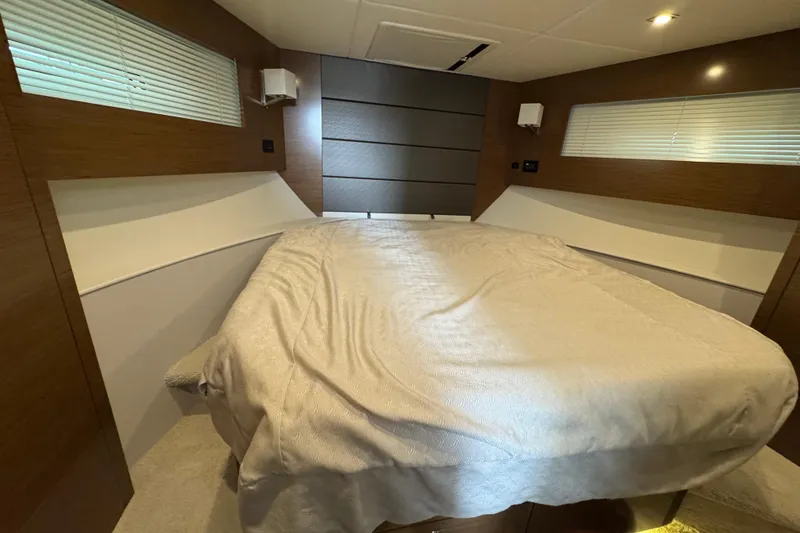 Slide: The Image of 2019 Cruisers Yachts 42 Cantius bedroom with modern design and cozy bedding. - 48