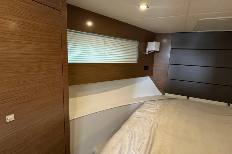 Slide: The Image of Interior cabin of 2019 Cruisers Yachts 42 Cantius with modern wood paneling. - 49