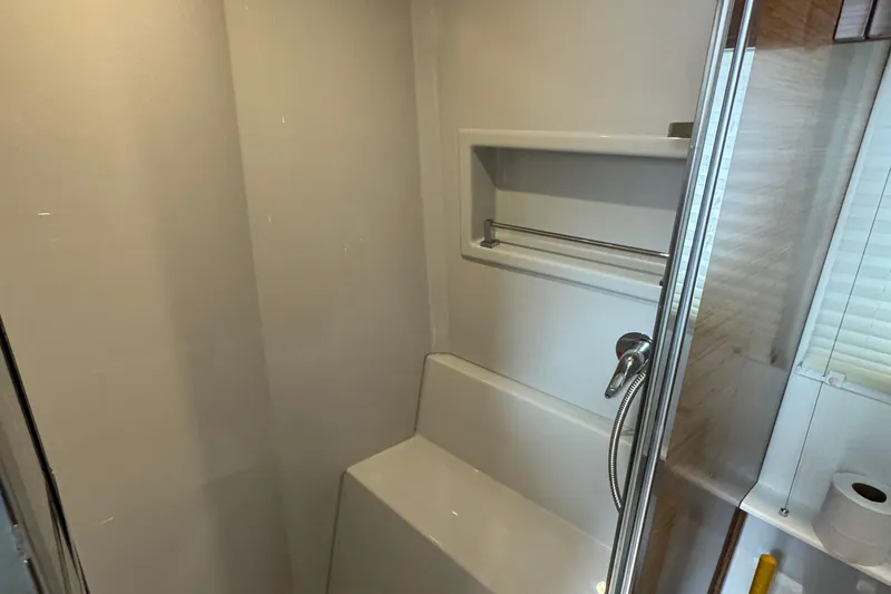 Slide: The Image of Shower area in 2019 Cruisers Yachts 42 Cantius, featuring modern fixtures and sleek design. - 59