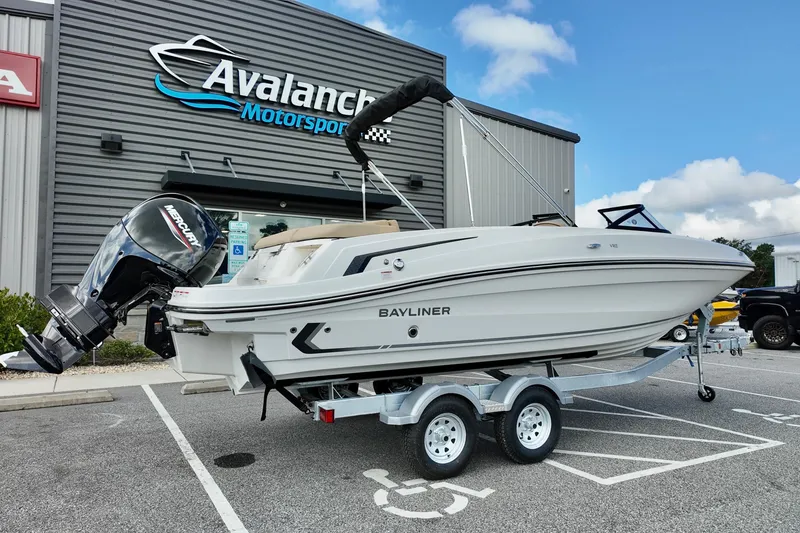 Slide: The Image of 2026 Bayliner VR6 boat on trailer at Avalanche Motorsports dealership. - 3
