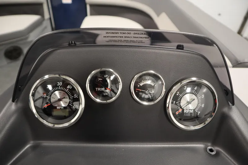 Slide: The Image of Dashboard of 2026 Lowe LS 170 boat with speedometer, trim, fuel, and RPM gauges. - 19
