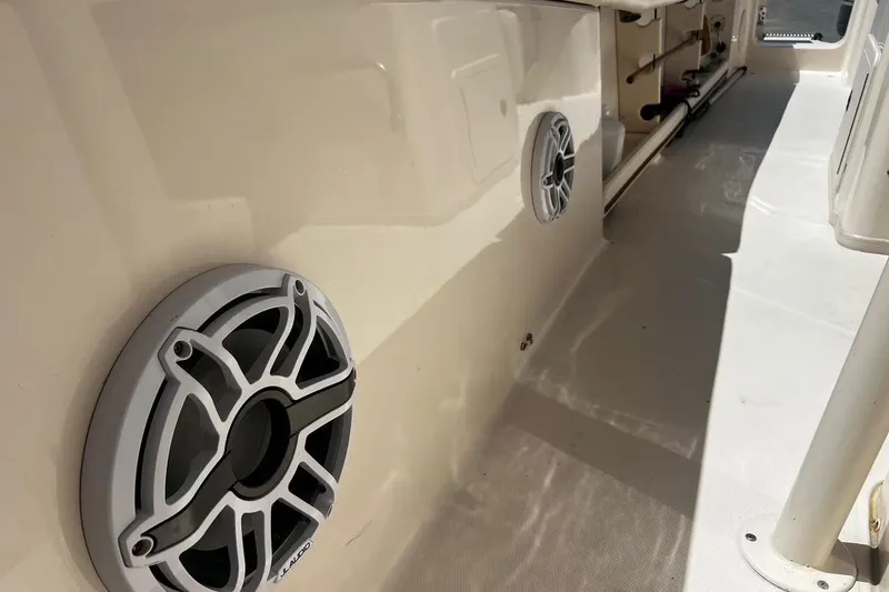 Slide: The Image of 2015 Grady-White Canyon 336 boat interior with JL Audio speakers. - 26