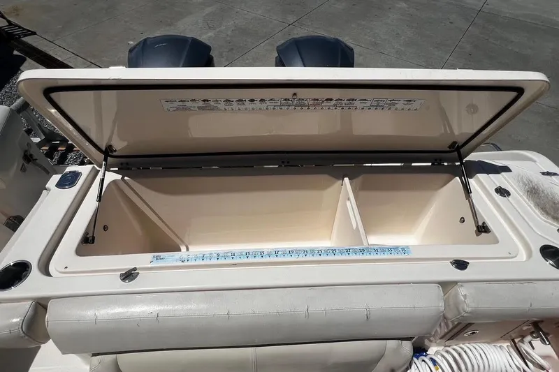 Slide: The Image of Open storage compartment on a 2015 Grady-White Canyon 336 boat. - 30
