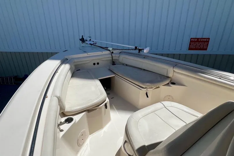 Slide: The Image of 2015 Grady-White Canyon 336 boat interior with seating and storage compartments. - 34