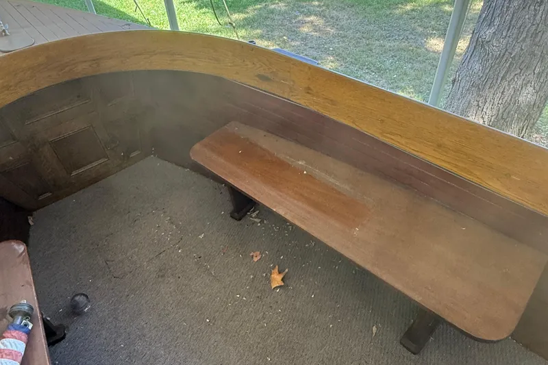 Slide: The Image of Interior of a 1904 Fay & Bowen Torpedo Launch with wooden bench seating. - 17