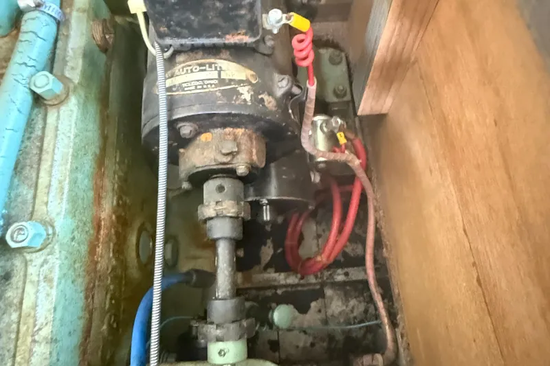 Slide: The Image of Engine component of 1904 Fay & Bowen Torpedo Launch with visible wiring and metal parts. - 20