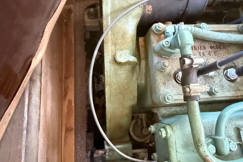 Slide: The Image of Close-up of a 1904 Fay & Bowen Torpedo Launch engine components. - 22