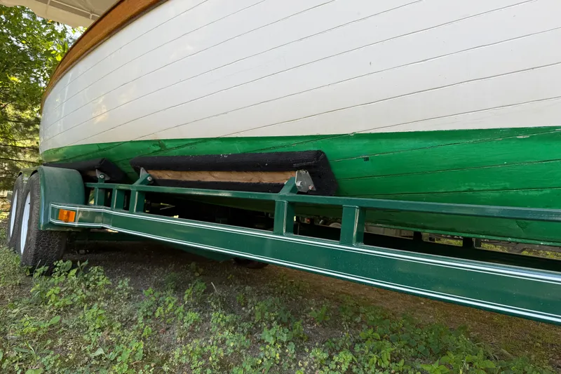 Slide: The Image of 1904 Fay & Bowen Torpedo Launch on trailer, green and white hull, side view. - 7