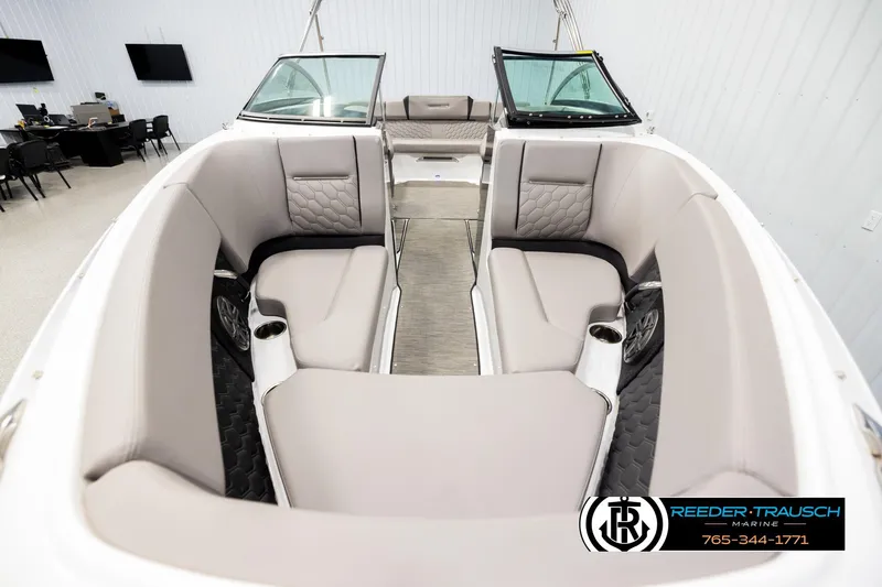 Slide: The Image of 2024 Four Winns H4 boat interior with luxurious seating and modern design. - 18