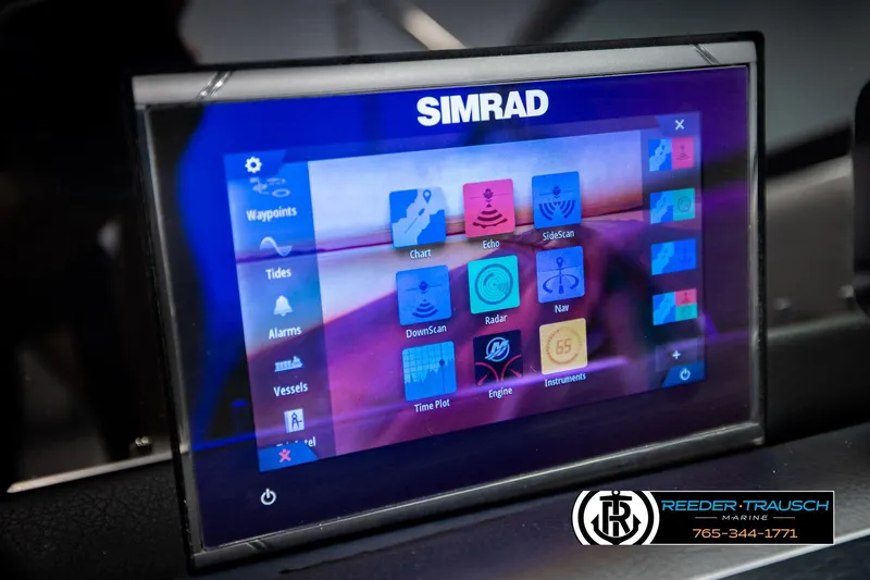 Slide: The Image of Simrad touchscreen display on 2024 Four Winns H4 boat dashboard. - 38