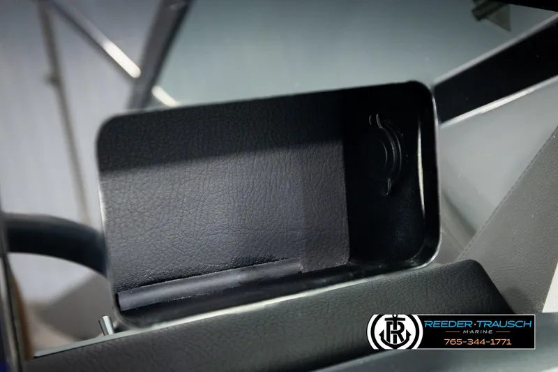Slide: The Image of 2024 Four Winns H4 boat interior storage compartment detail. - 40