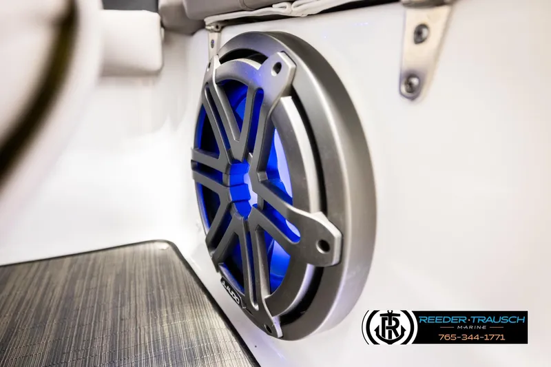 Slide: The Image of 2024 Four Winns H4 boat speaker with blue LED lighting. - 48