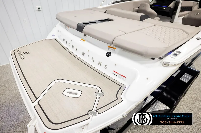 Slide: The Image of 2024 Four Winns H4 boat with spacious deck and comfortable seating. - 50