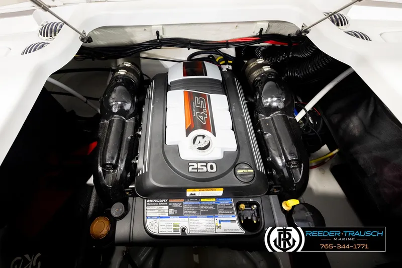 Slide: The Image of 2024 Four Winns H4 boat engine compartment with Mercury 4.5L 250 HP engine. - 53