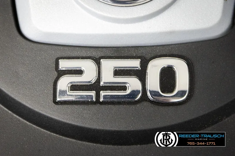 Slide: The Image of Close-up of 2024 Four Winns H4 engine detail with '250' emblem. - 54