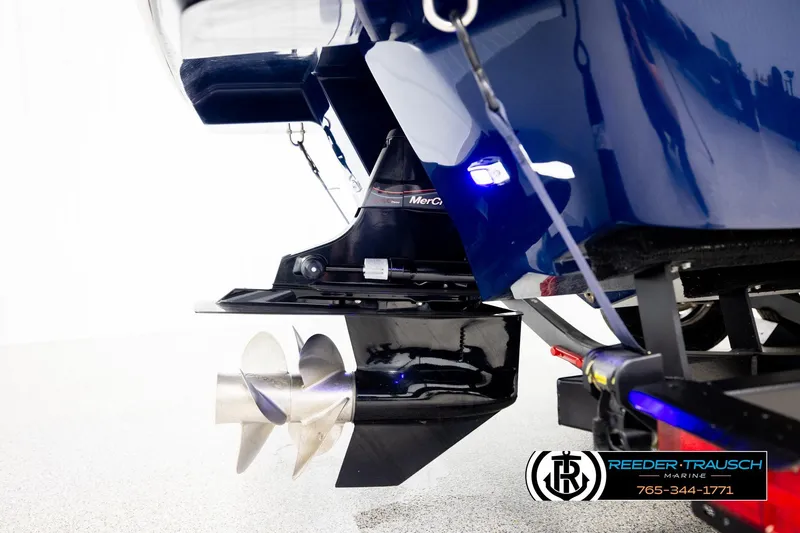 Slide: The Image of 2024 Four Winns H4 boat stern with propeller and trailer detail. - 56