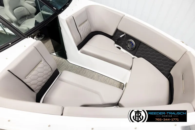 Slide: The Image of 2024 Four Winns H4 boat interior with stylish seating and modern design. - 9