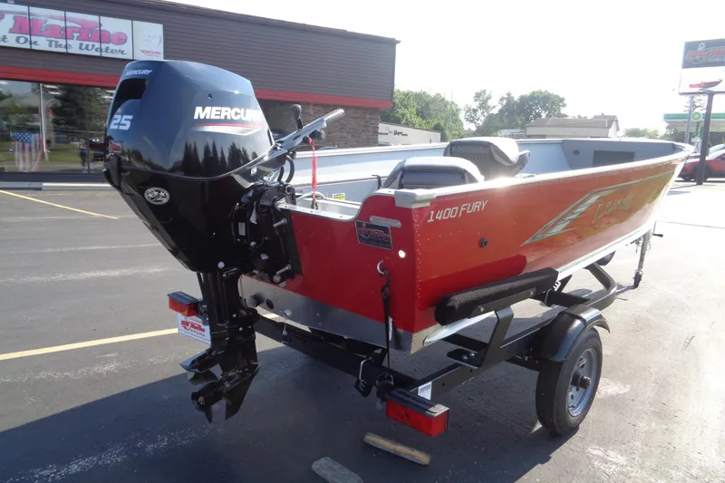 Slide: The Image of 2026 Lund 1400 Fury Tiller boat with Mercury 25 engine on trailer. - 4