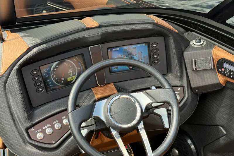 Slide: The Image of 2020 Centurion Ri257 dashboard with digital displays and steering wheel. - 15