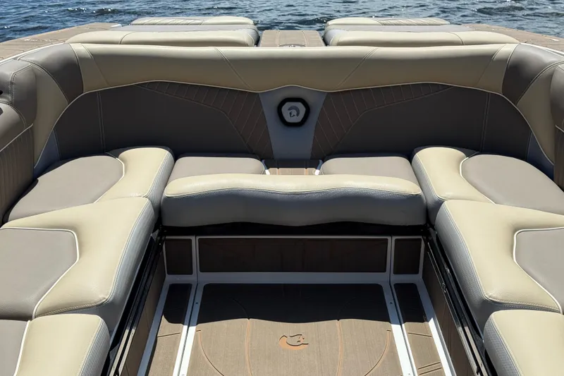 Slide: The Image of 2023 Centurion Fi25 boat interior with luxurious seating and elegant design. - 13