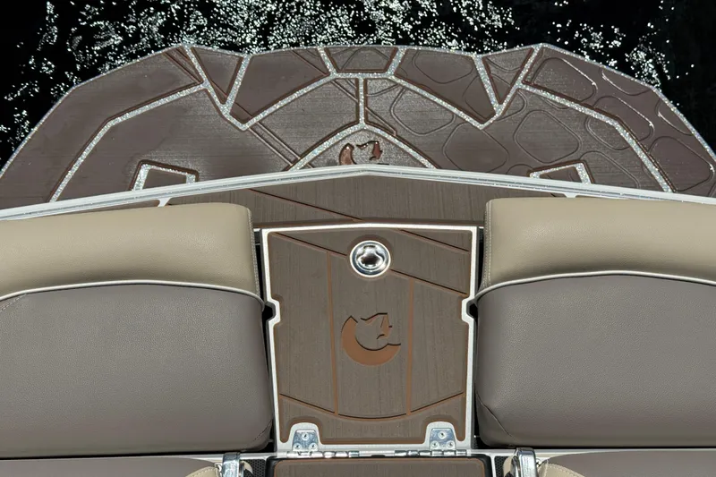 Slide: The Image of 2023 Centurion Fi25 boat deck with cushioned seating and stylish design. - 14