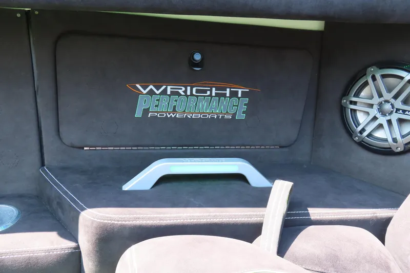 Slide: The Image of Interior of 2019 Wright Performance WP 360 powerboat with speaker and logo. - 13