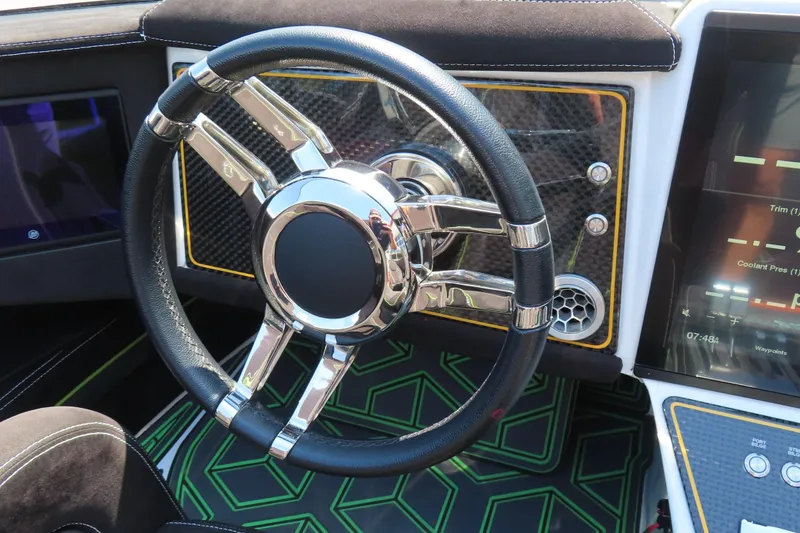 Slide: The Image of 2019 Wright Performance WP 360 interior with sleek steering wheel and modern dashboard. - 16