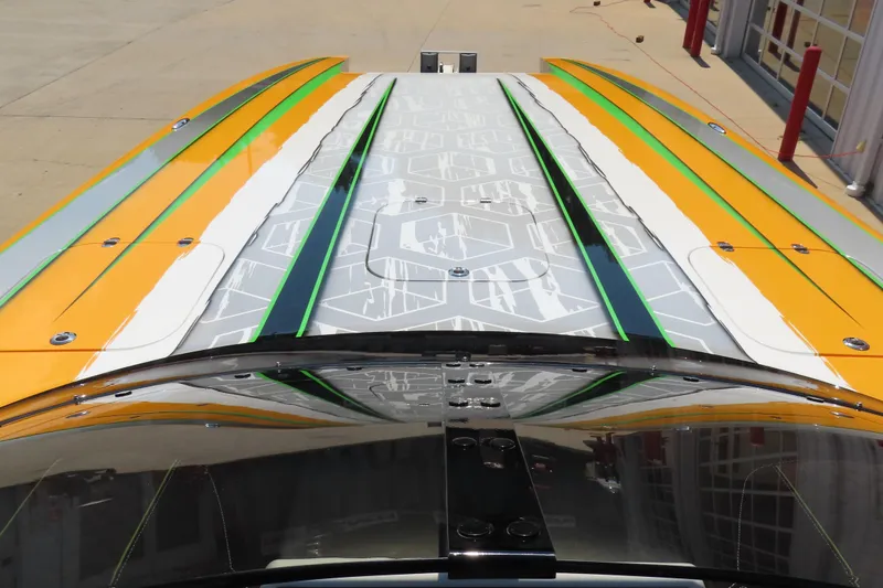 Slide: The Image of Colorful top view of 2019 Wright Performance WP 360 boat with vibrant stripes. - 19