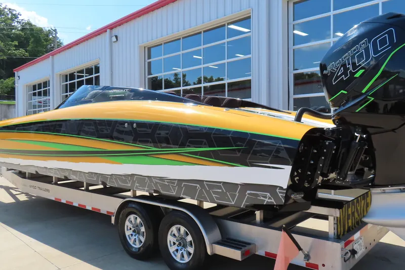 Slide: The Image of 2019 Wright Performance WP 360 boat with vibrant design on trailer. - 7
