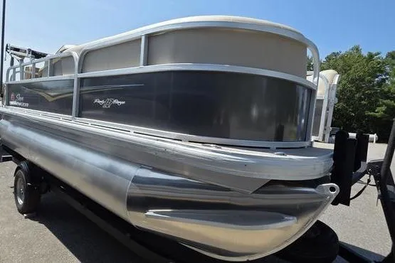 Slide: The Image of 2025 Sun Tracker PB 18 DLX pontoon boat on trailer, side view. - 5