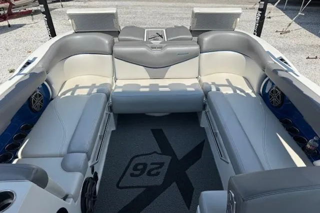 Slide: The Image of 2016 MasterCraft X26 boat interior with spacious seating and modern design. - 15