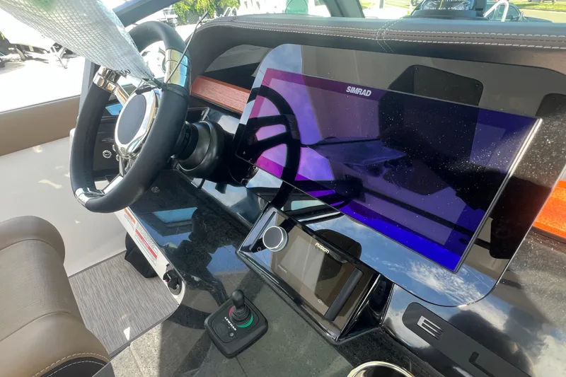 Slide: The Image of Elite 27 OB helm with Simrad display - 9