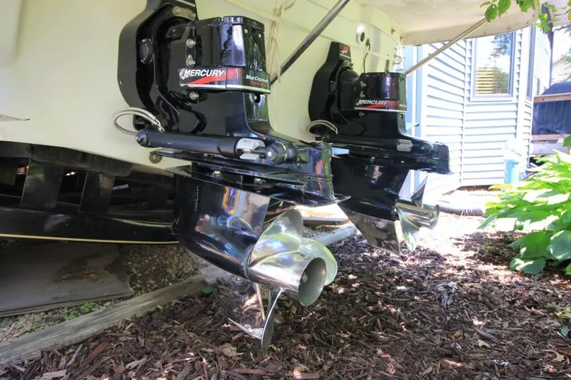 Slide: The Image of 2002 Crownline 290 CR boat with dual Mercury outboard motors. - 23