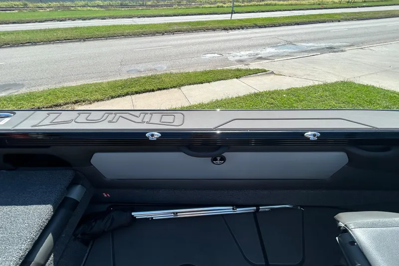 Slide: The Image of 2026 Lund 1875 Tyee boat interior, showcasing sleek design and storage features. - 25