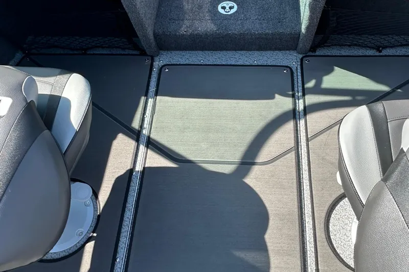 Slide: The Image of Interior of 2026 Lund 1875 Tyee boat with two seats and carpeted flooring. - 30